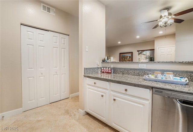 5250 S Rainbow Blvd Unit 1167, Las Vegas, NV 89118 - kitchen with stainless steel dishwasher, ceiling fan, white cabinets, light tile patterned floors, and recessed lighting