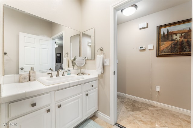 5250 S Rainbow Blvd Unit 1167, Las Vegas, NV 89118 - bathroom with vanity and baseboards