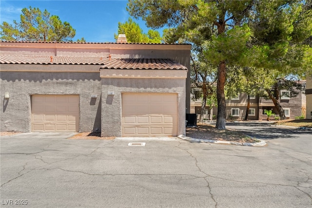5250 S Rainbow Blvd Unit 1167, Las Vegas, NV 89118 - view of front of property with stucco siding and a tiled roof