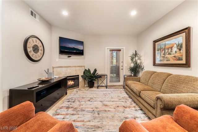 5250 S Rainbow Blvd Unit 1167, Las Vegas, NV 89118 - living area with recessed lighting, light wood finished floors, and a tiled fireplace