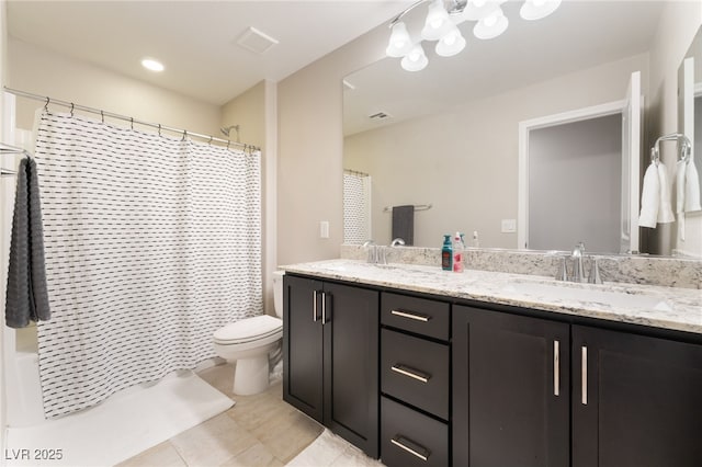 12478 Dolan Point St, Las Vegas, NV 89138 - bathroom featuring double vanity, tile patterned floors, and shower / bath combination with curtain