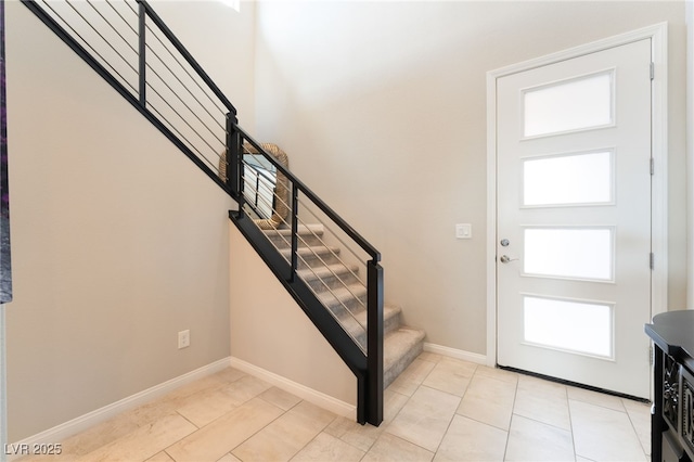 12478 Dolan Point St, Las Vegas, NV 89138 - entryway featuring stairway and light tile patterned flooring