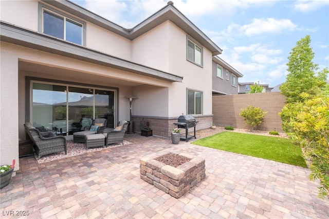12478 Dolan Point St, Las Vegas, NV 89138 - view of patio with an outdoor living space with a fire pit and a grill