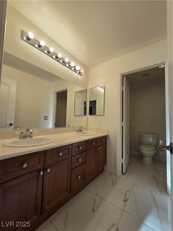 7428 Timber Run St, Las Vegas, NV 89149 - full bathroom featuring double vanity and marble finish flooring