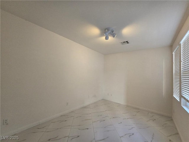 7428 Timber Run St, Las Vegas, NV 89149 - empty room featuring light marble finish floors and baseboards