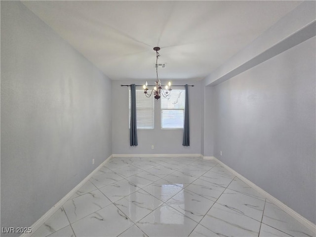 7428 Timber Run St, Las Vegas, NV 89149 - unfurnished room featuring a chandelier and light marble finish floors