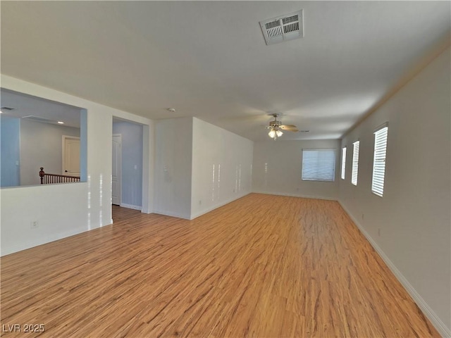 7428 Timber Run St, Las Vegas, NV 89149 - unfurnished room with a ceiling fan and light wood-style flooring
