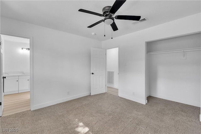 4186 Toronto Cir, Las Vegas, NV 89121 - unfurnished bedroom featuring light carpet, a closet, and ceiling fan