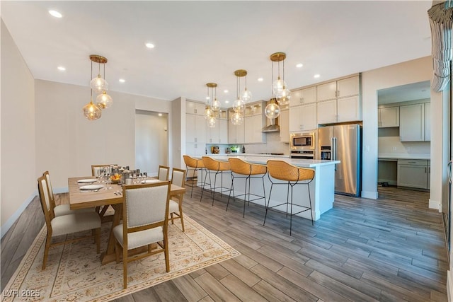4122 Yucca Bloom St Unit 0, Las Vegas, NV 89135 - dining area with wood finished floors, recessed lighting, and a chandelier