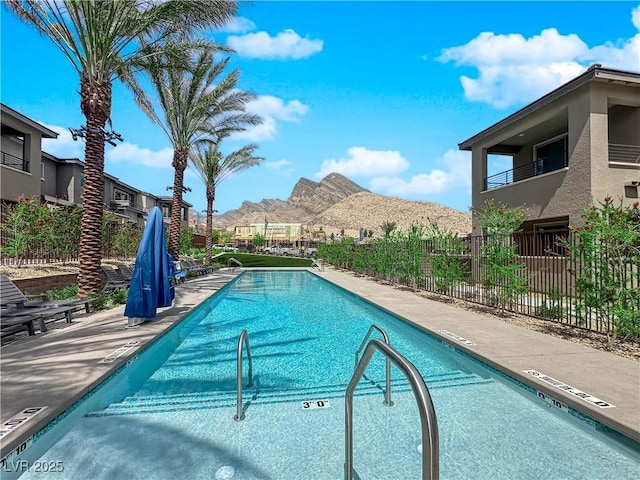 11418 Crimson Ledge Ave, Las Vegas, NV 89138 - community pool featuring a mountain view and a patio area