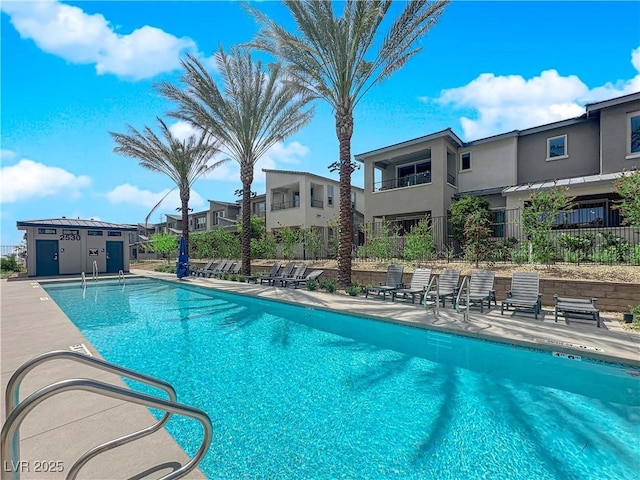 11418 Crimson Ledge Ave, Las Vegas, NV 89138 - community pool featuring a patio and a residential view