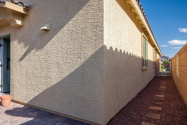 1110 Crystal Grotto Ave, North Las Vegas, NV 89081 - view of home's exterior featuring stucco siding