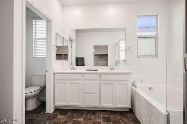 1110 Crystal Grotto Ave, North Las Vegas, NV 89081 - bathroom with double vanity, a bath, healthy amount of natural light, and a stall shower
