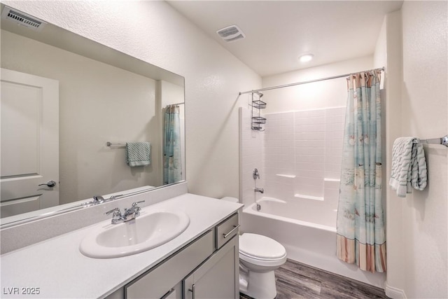 619 Harmony Rock Ave, North Las Vegas, NV 89081 - bathroom featuring vanity, wood finished floors, and shower / bath combo