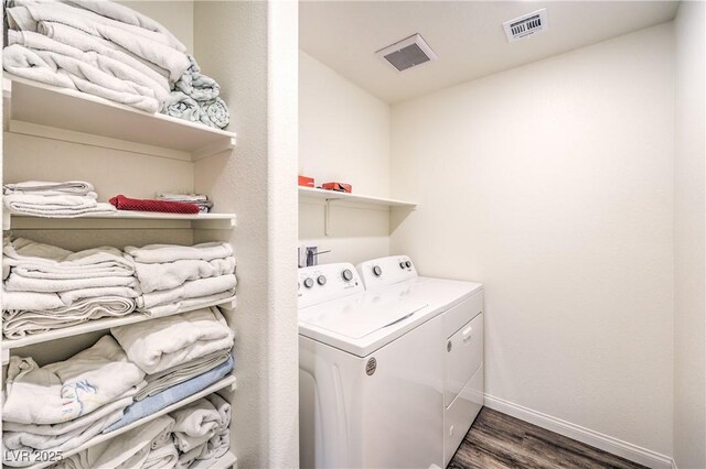 619 Harmony Rock Ave, North Las Vegas, NV 89081 - laundry room featuring washing machine and clothes dryer and dark wood-style floors