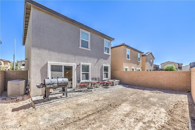 619 Harmony Rock Ave, North Las Vegas, NV 89081 - back of house with stucco siding, a patio, a fenced backyard, and a residential view