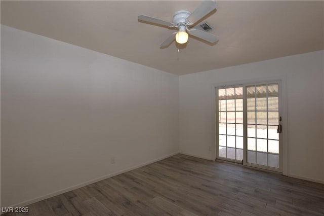 3323 Bancroft Cir, Las Vegas, NV 89121 - unfurnished room featuring wood finished floors and ceiling fan