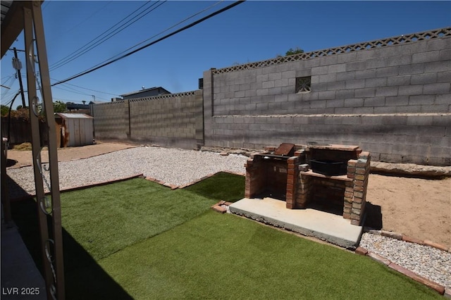 3323 Bancroft Cir, Las Vegas, NV 89121 - fenced backyard featuring a storage shed