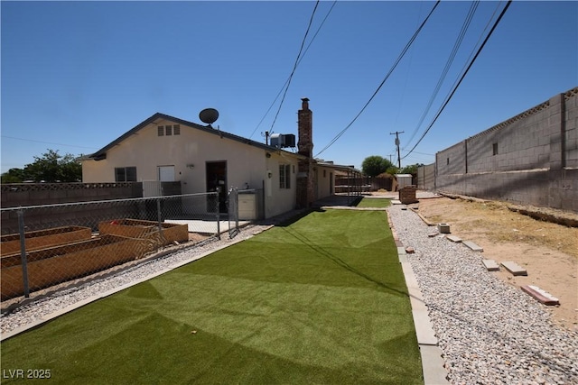 3323 Bancroft Cir, Las Vegas, NV 89121 - fenced backyard featuring a patio