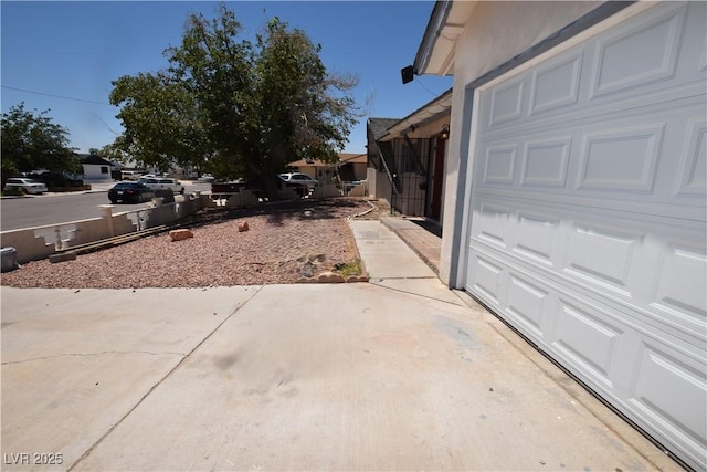 3323 Bancroft Cir, Las Vegas, NV 89121 - view of yard with a garage
