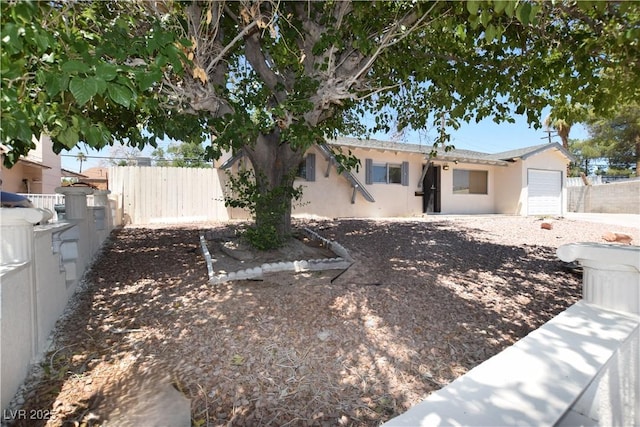 3323 Bancroft Cir, Las Vegas, NV 89121 - view of yard with a garage