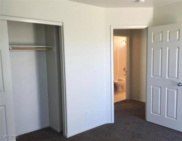 10225 Headrick Dr, Las Vegas, NV 89166 - unfurnished bedroom with dark colored carpet and a closet