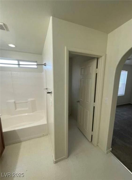10225 Headrick Dr, Las Vegas, NV 89166 - full bathroom with baseboards and washtub / shower combination