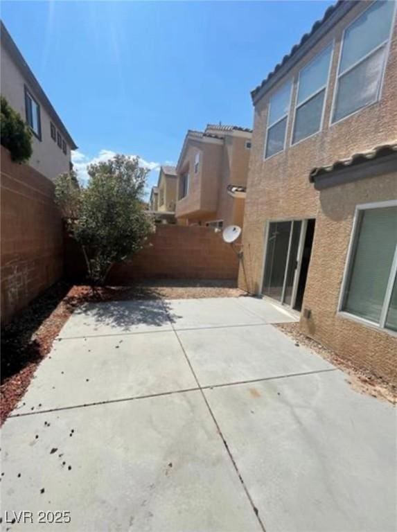 10225 Headrick Dr, Las Vegas, NV 89166 - fenced backyard with a patio area