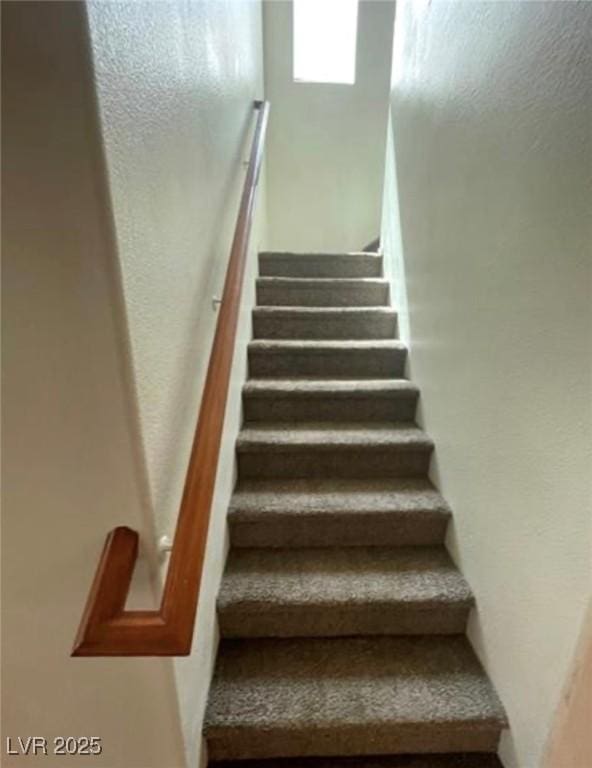 10225 Headrick Dr, Las Vegas, NV 89166 - stairway featuring a textured wall