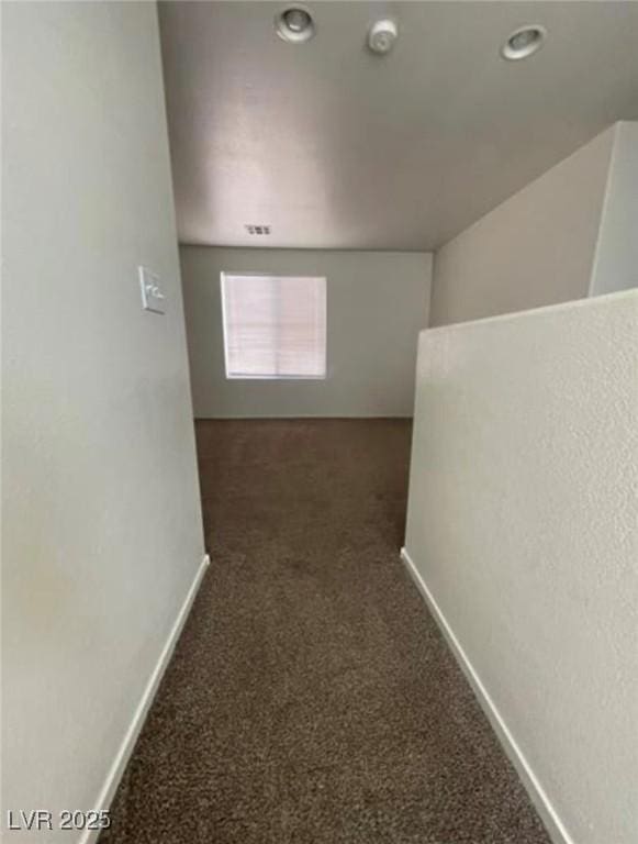 10225 Headrick Dr, Las Vegas, NV 89166 - hallway with carpet flooring and recessed lighting