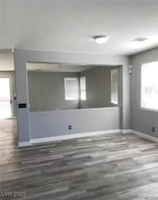 7349 Dolphine Crest Ave, Las Vegas, NV 89129 - empty room with baseboards and wood finished floors