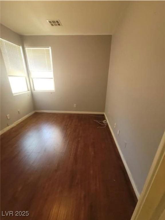 7349 Dolphine Crest Ave, Las Vegas, NV 89129 - unfurnished room featuring wood finished floors