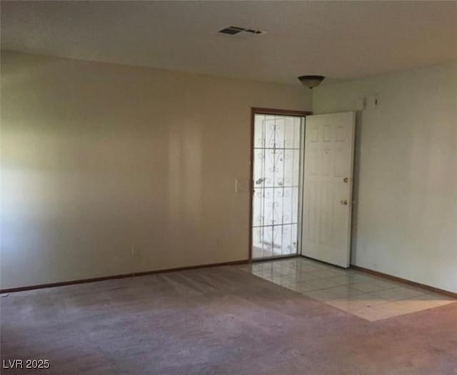 6671 W Tropicana Ave Unit 103, Las Vegas, NV 89103 - spare room with baseboards and carpet floors