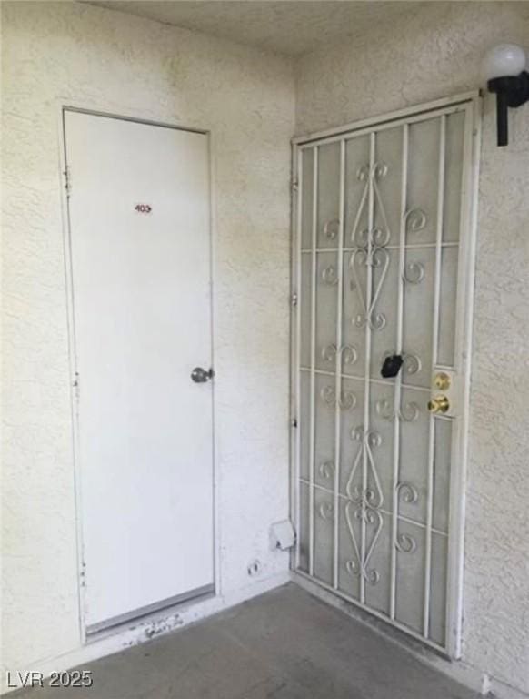 6671 W Tropicana Ave Unit 103, Las Vegas, NV 89103 - entrance to property with stucco siding