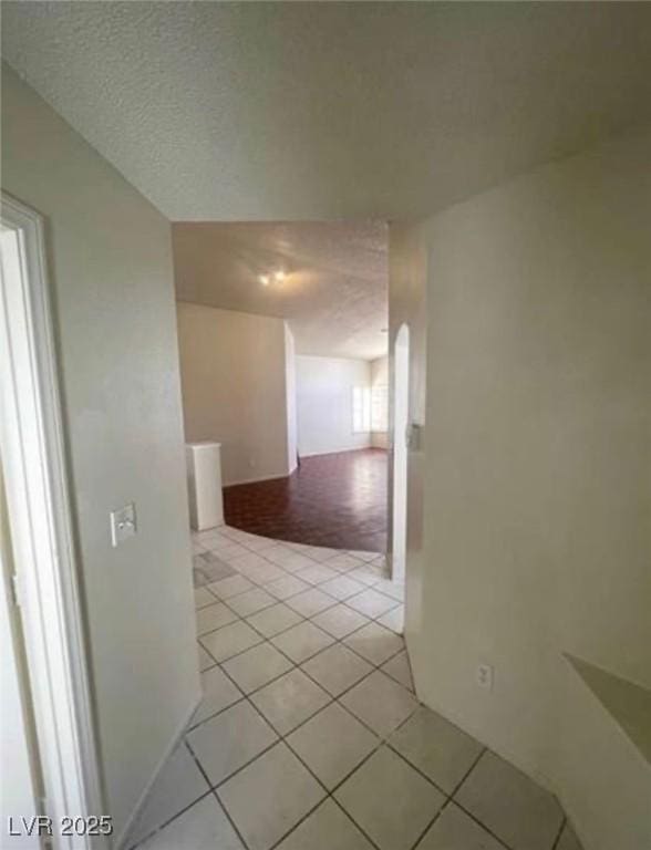 9820 Cross Creek Way, Las Vegas, NV 89117 - hallway with light tile patterned floors