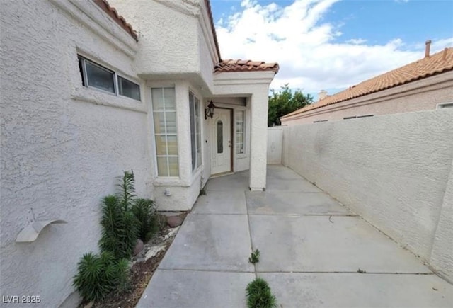9820 Cross Creek Way, Las Vegas, NV 89117 - fenced backyard with a patio area