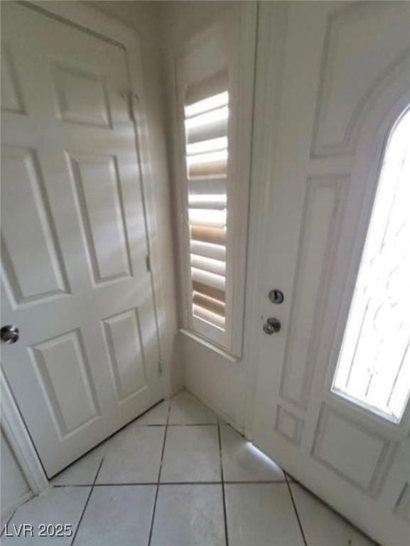 9820 Cross Creek Way, Las Vegas, NV 89117 - foyer entrance with light tile patterned floors and plenty of natural light