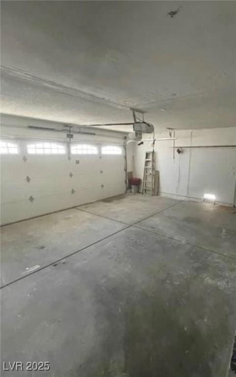 9820 Cross Creek Way, Las Vegas, NV 89117 - garage with a garage door opener