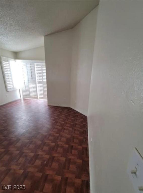 9820 Cross Creek Way, Las Vegas, NV 89117 - spare room with a textured ceiling