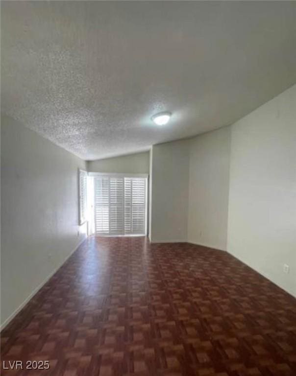9820 Cross Creek Way, Las Vegas, NV 89117 - spare room featuring a textured ceiling
