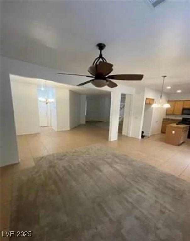 7879 Villa Pintura Ave, Las Vegas, NV 89131 - unfurnished living room featuring a ceiling fan and recessed lighting