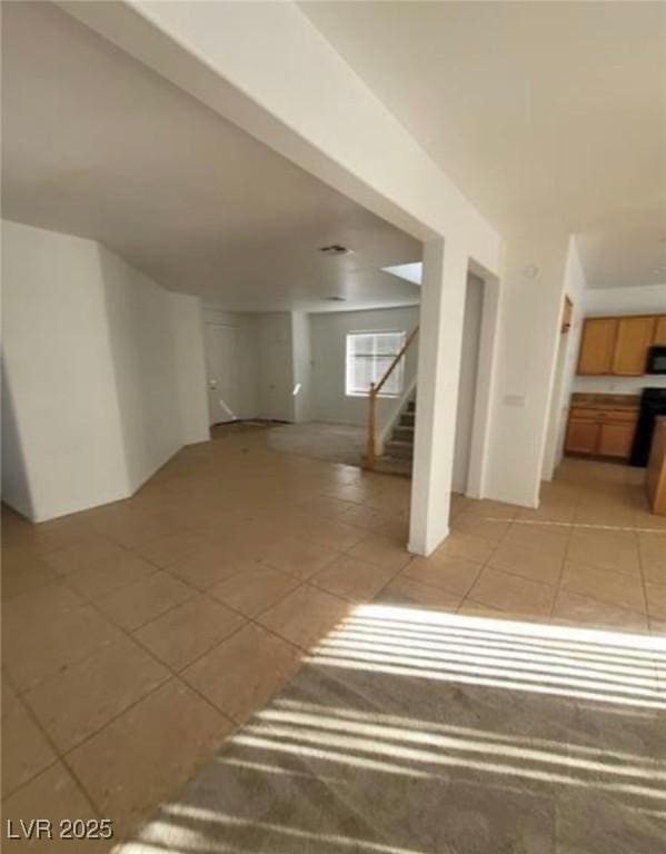 7879 Villa Pintura Ave, Las Vegas, NV 89131 - below grade area with stairs and light tile patterned floors