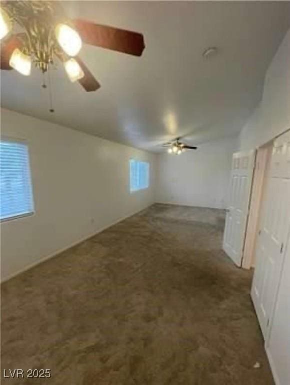 7879 Villa Pintura Ave, Las Vegas, NV 89131 - unfurnished living room with a ceiling fan and carpet flooring