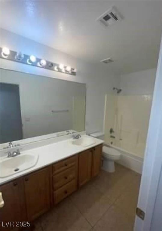 7879 Villa Pintura Ave, Las Vegas, NV 89131 - bathroom with double vanity, tile patterned flooring, and shower / bath combination