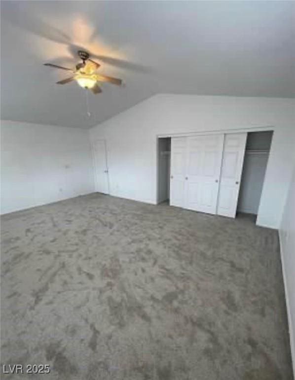 7879 Villa Pintura Ave, Las Vegas, NV 89131 - unfurnished bedroom featuring vaulted ceiling, carpet flooring, a closet, and a ceiling fan