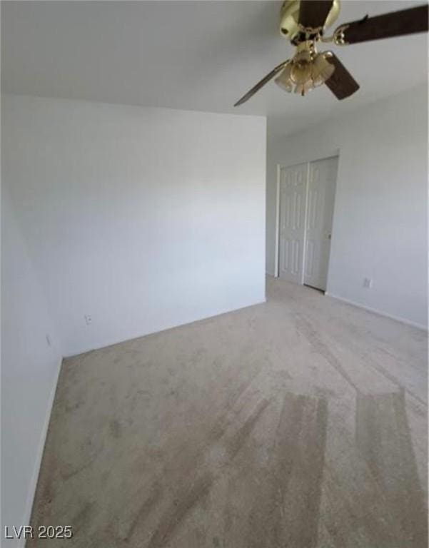 7879 Villa Pintura Ave, Las Vegas, NV 89131 - unfurnished room featuring light colored carpet and a ceiling fan