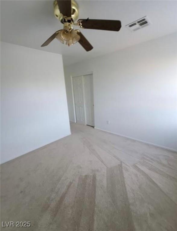7879 Villa Pintura Ave, Las Vegas, NV 89131 - unfurnished room with a ceiling fan and light colored carpet