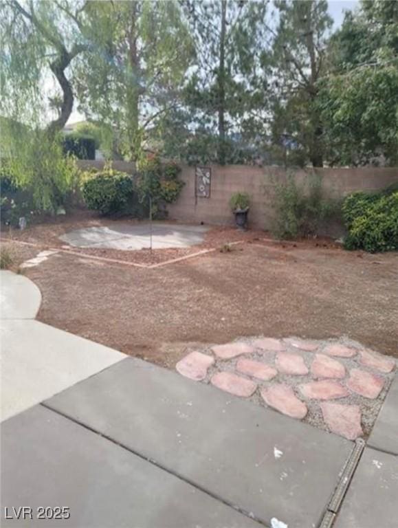 7879 Villa Pintura Ave, Las Vegas, NV 89131 - view of yard with a patio area