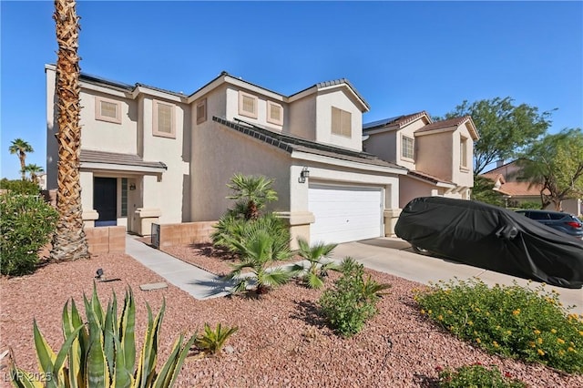 217 Turkey Creek Way, Henderson, NV 89074 - view of front of home featuring stucco siding, concrete driveway, and a garage