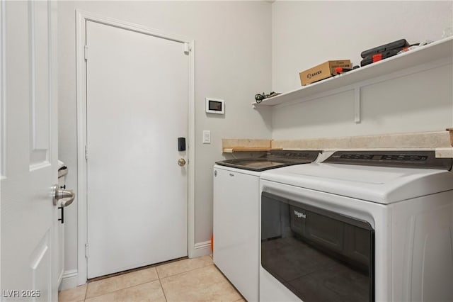 217 Turkey Creek Way, Henderson, NV 89074 - laundry room featuring washing machine and dryer and light tile patterned floors